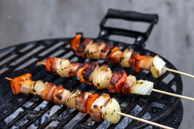 The food is being prepared on the grill